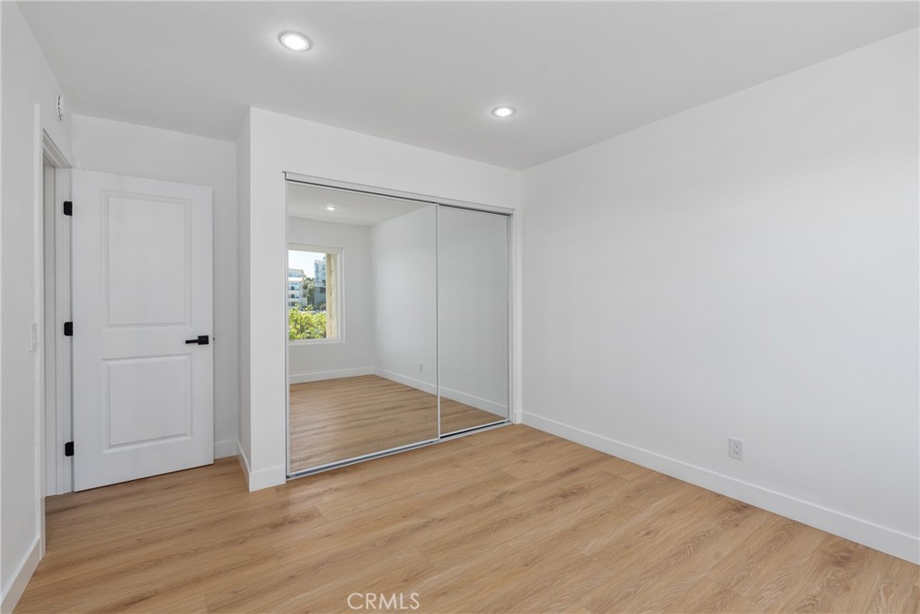 15 Hilltop Circle Rancho Palos Verdes, CA 90275 - Photo 29 of 40 a view of an empty room with wooden floor