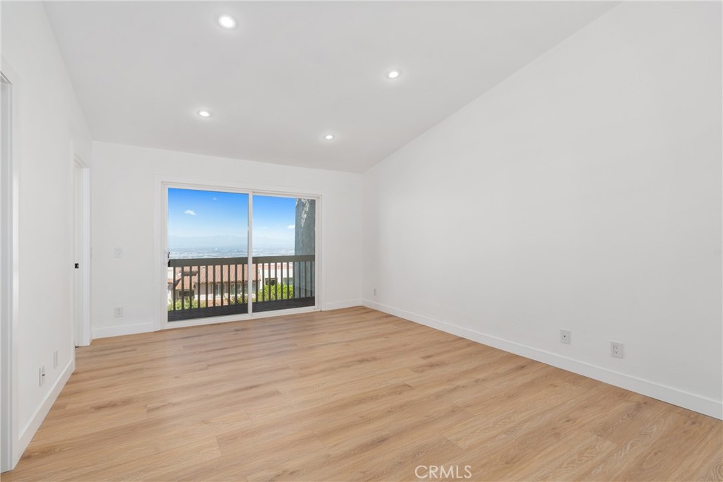 15 Hilltop Circle Rancho Palos Verdes, CA 90275 - Photo 32 of 40 a view of empty room with wooden floor