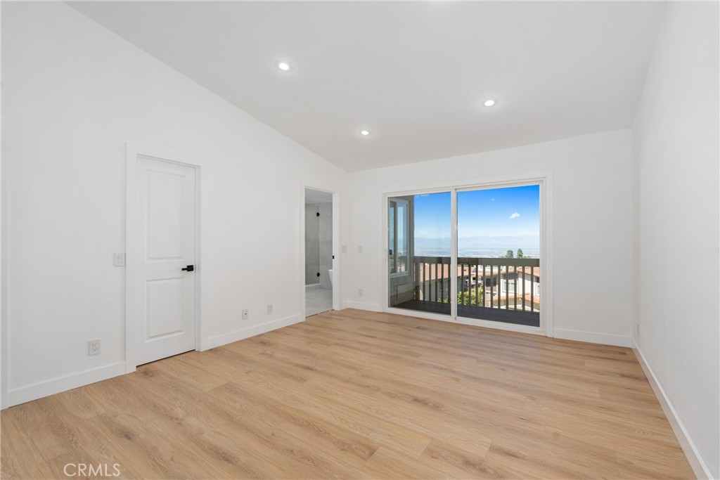 15 Hilltop Circle Rancho Palos Verdes, CA 90275 - Photo 33 of 40 a view of empty room with wooden floor