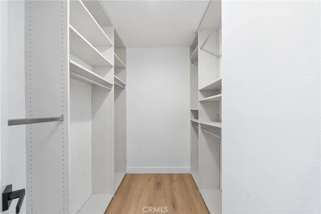 a view of an empty walk in closet