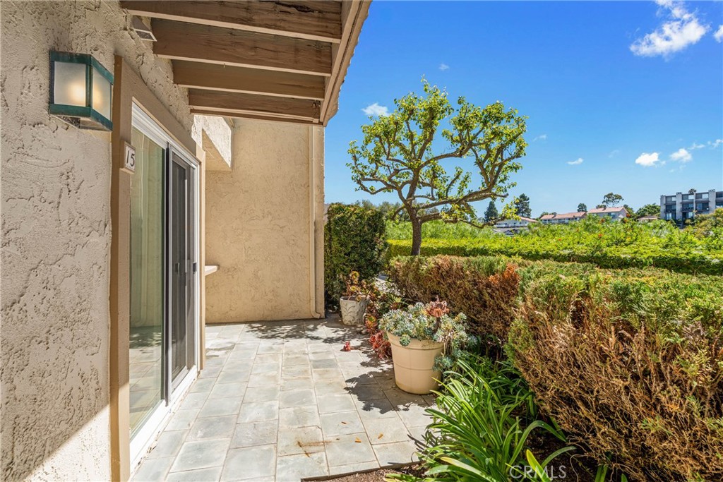 15 Hilltop Circle Rancho Palos Verdes, CA 90275 - Photo 5 of 40 a view of a pathway of a house with a yard