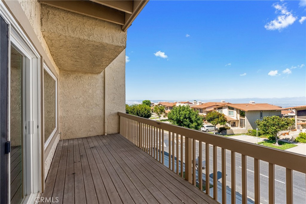 15 Hilltop Circle Rancho Palos Verdes, CA 90275 - Photo 6 of 40 a view of a balcony with wooden floor
