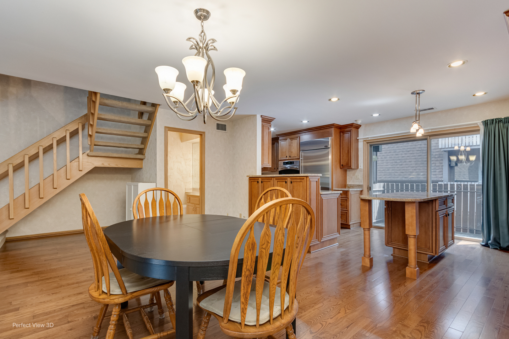 1020 Deerfield Road Highland Park, IL 60035 - Photo 5 of 29 a dining room with furniture a chandelier and wooden floor