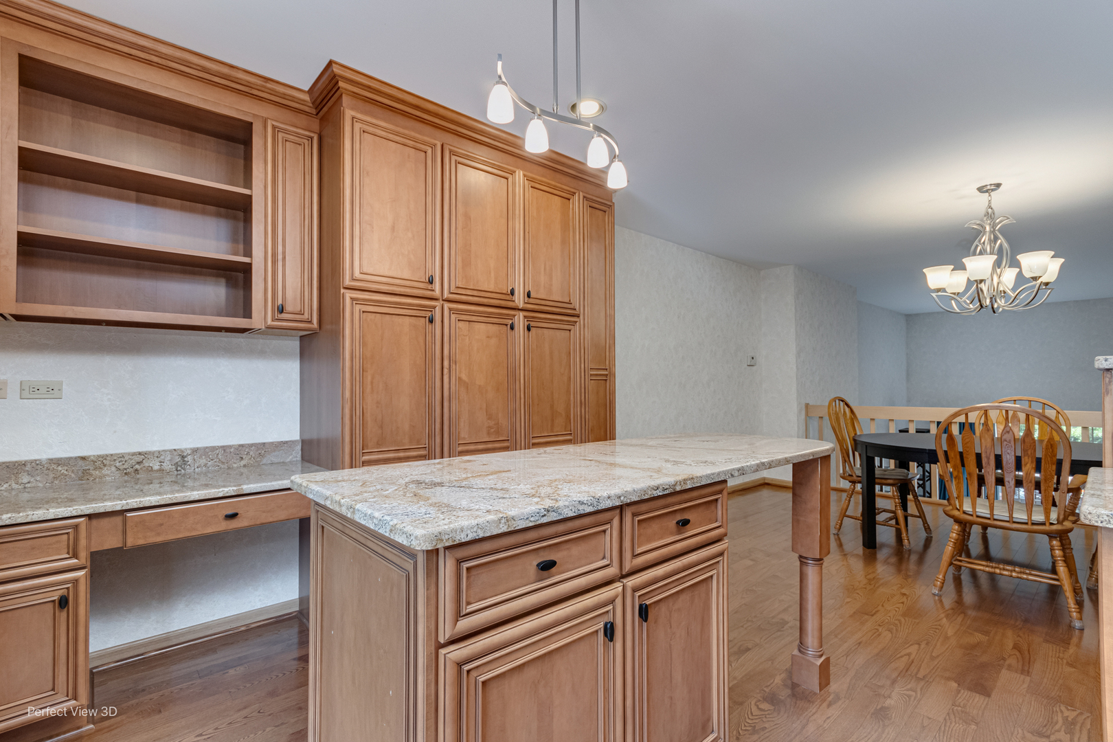 1020 Deerfield Road Highland Park, IL 60035 - Photo 9 of 29 a kitchen with kitchen island a counter space a sink appliances and cabinets