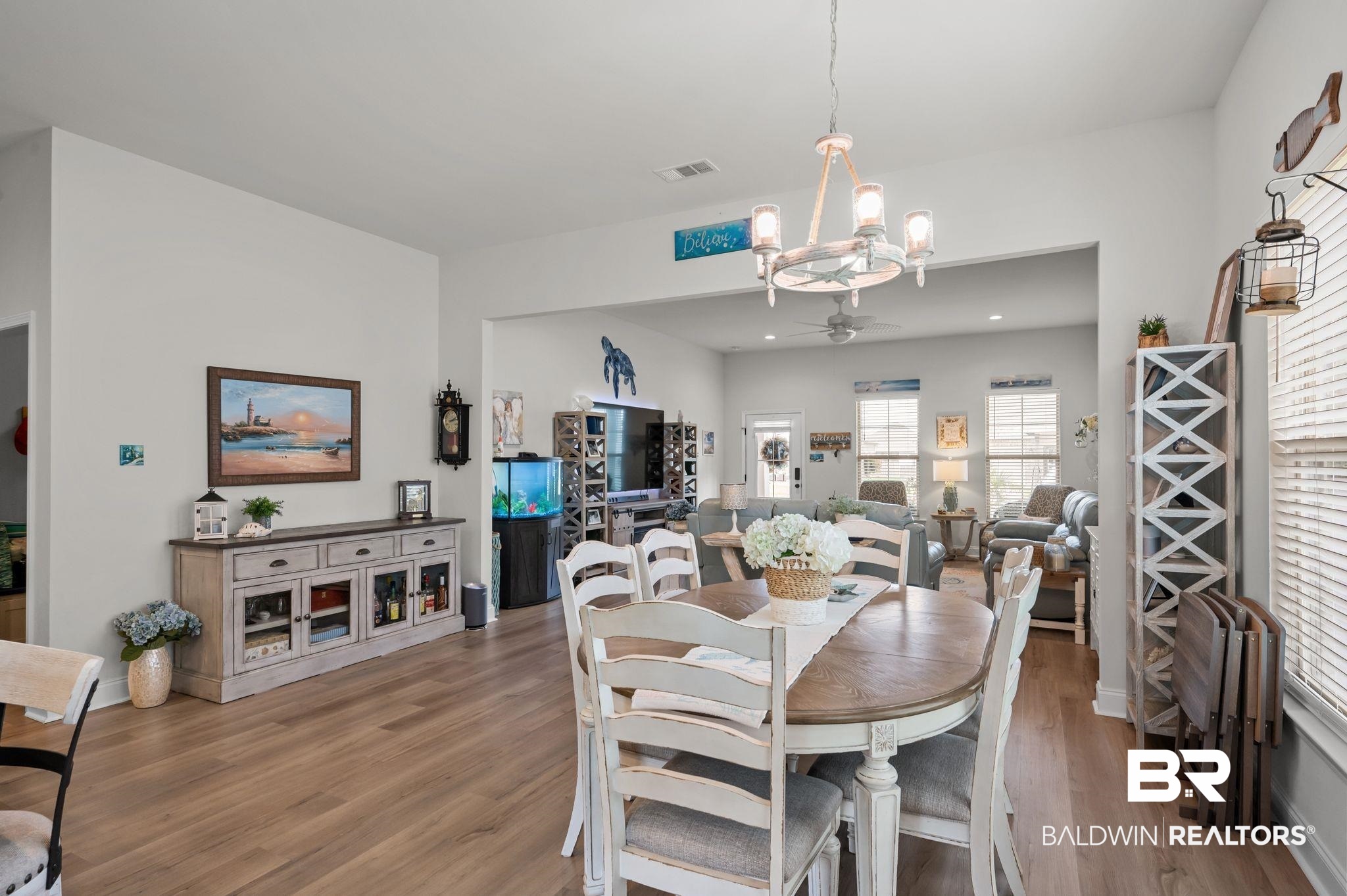 1165 Stella Road Foley, AL 36535 - Photo 10 of 42 Dining space featuring a chandelier, wood finished floors, ceiling fan, and recessed lighting