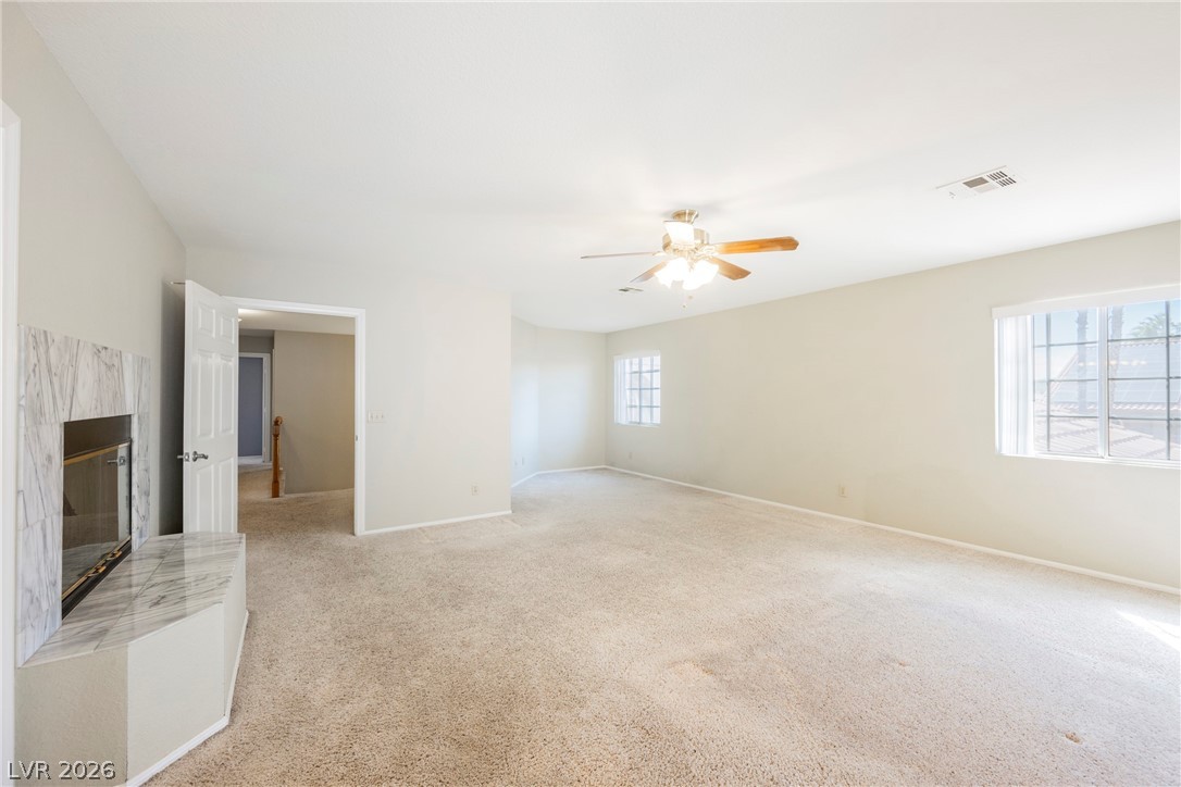 1510 Tree Top Court Henderson, NV 89014 - Photo 42 of 97 Primary Bedroom with Fireplace and sitting room