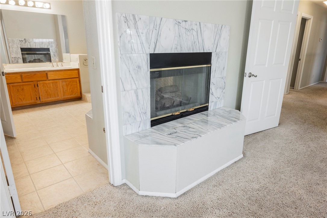 1510 Tree Top Court Henderson, NV 89014 - Photo 44 of 97 Primary Double-sided Fireplace