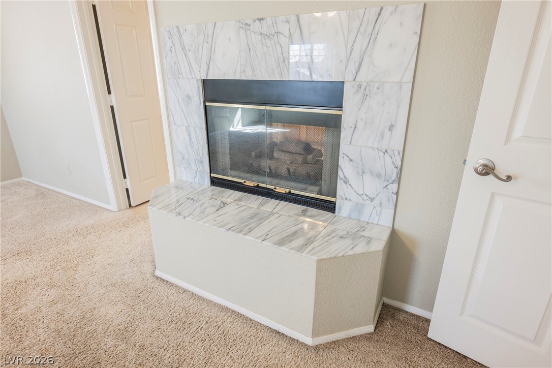 1510 Tree Top Court Henderson, NV 89014 - Photo 45 of 97 Primary Double-sided Fireplace