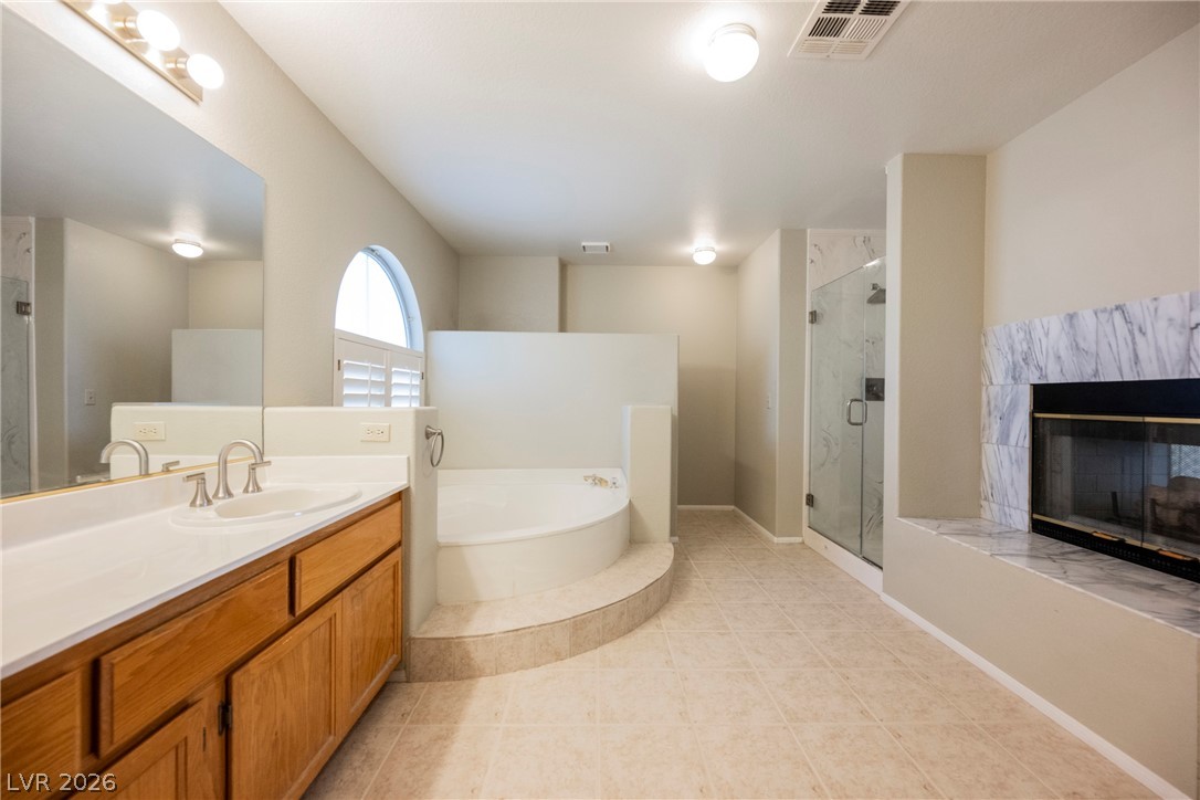 1510 Tree Top Court Henderson, NV 89014 - Photo 49 of 97 Large Soaking Tub with Fireplace