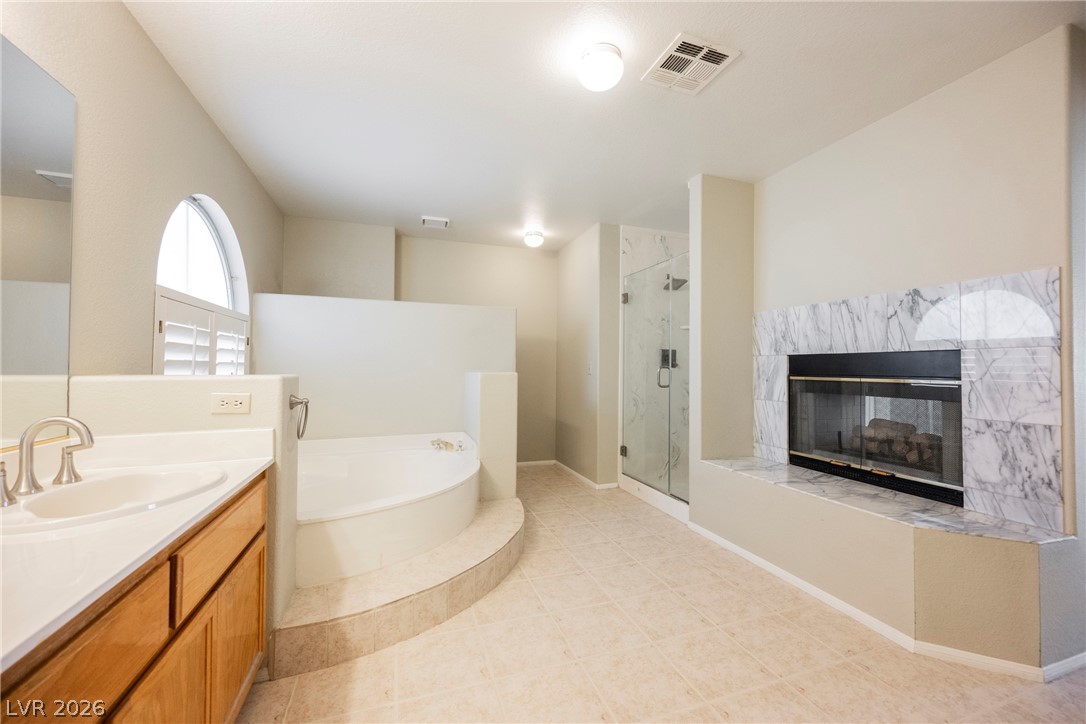 1510 Tree Top Court Henderson, NV 89014 - Photo 50 of 97 Separate Shower, Large Soaking Tub & Fireplace