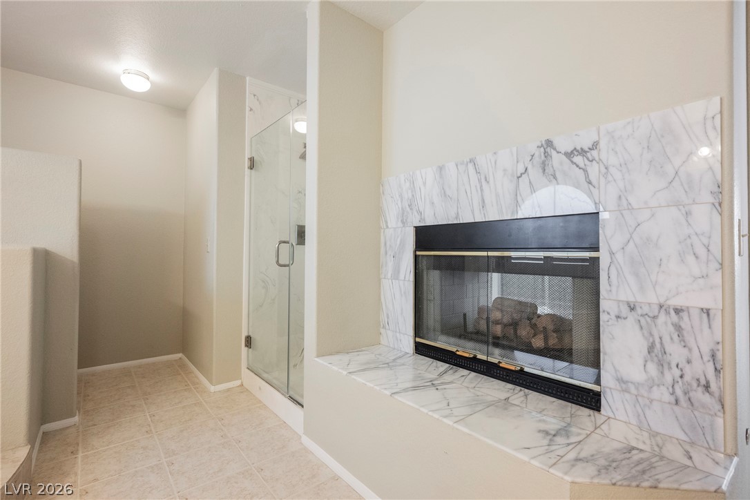 1510 Tree Top Court Henderson, NV 89014 - Photo 52 of 97 Primary Bathroom Fireplace