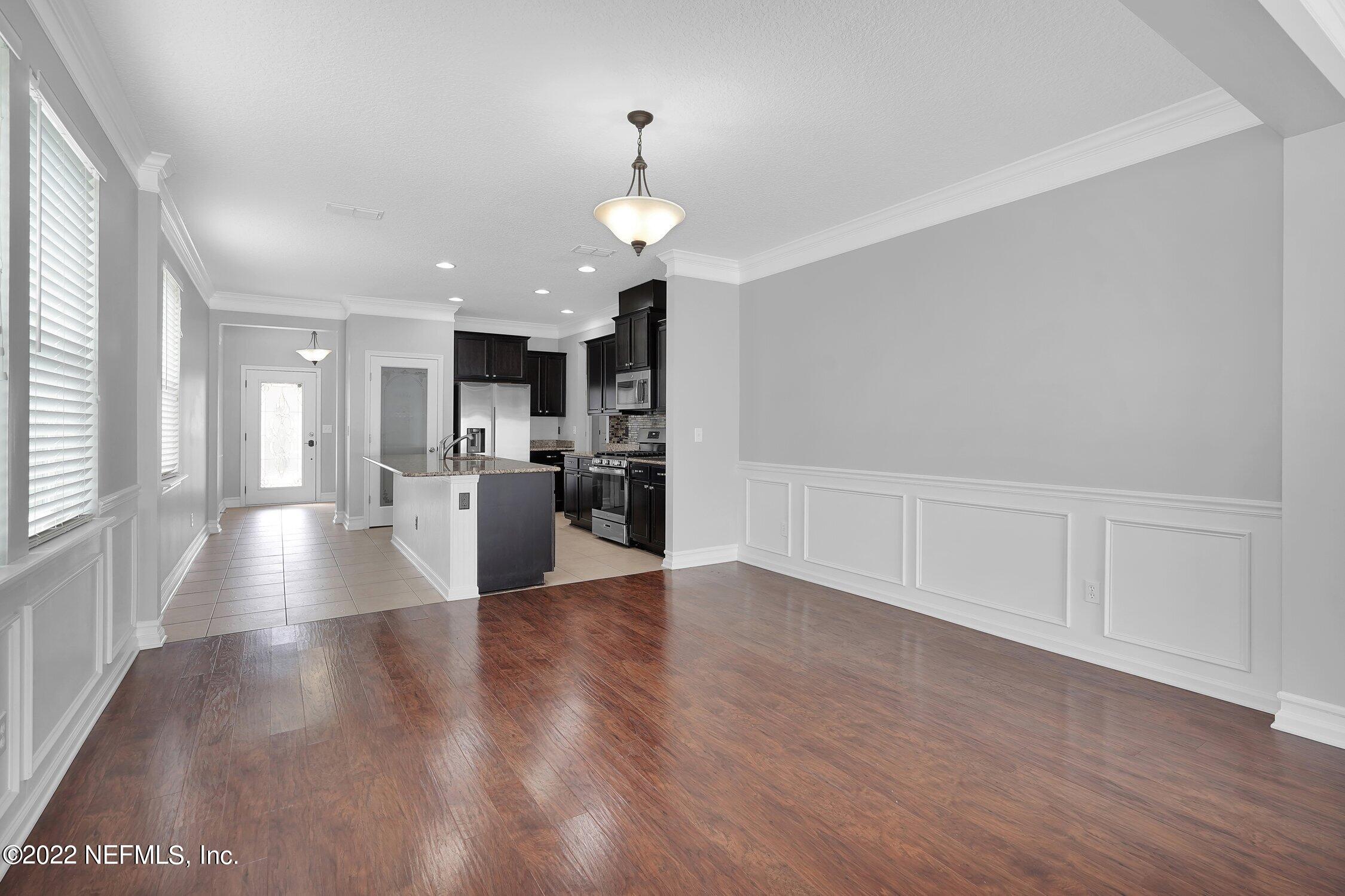 242 Taylor Ridge Avenue Ponte Vedra, FL 32081 - Photo 13 of 26 a view of a kitchen with a sink and a refrigerator