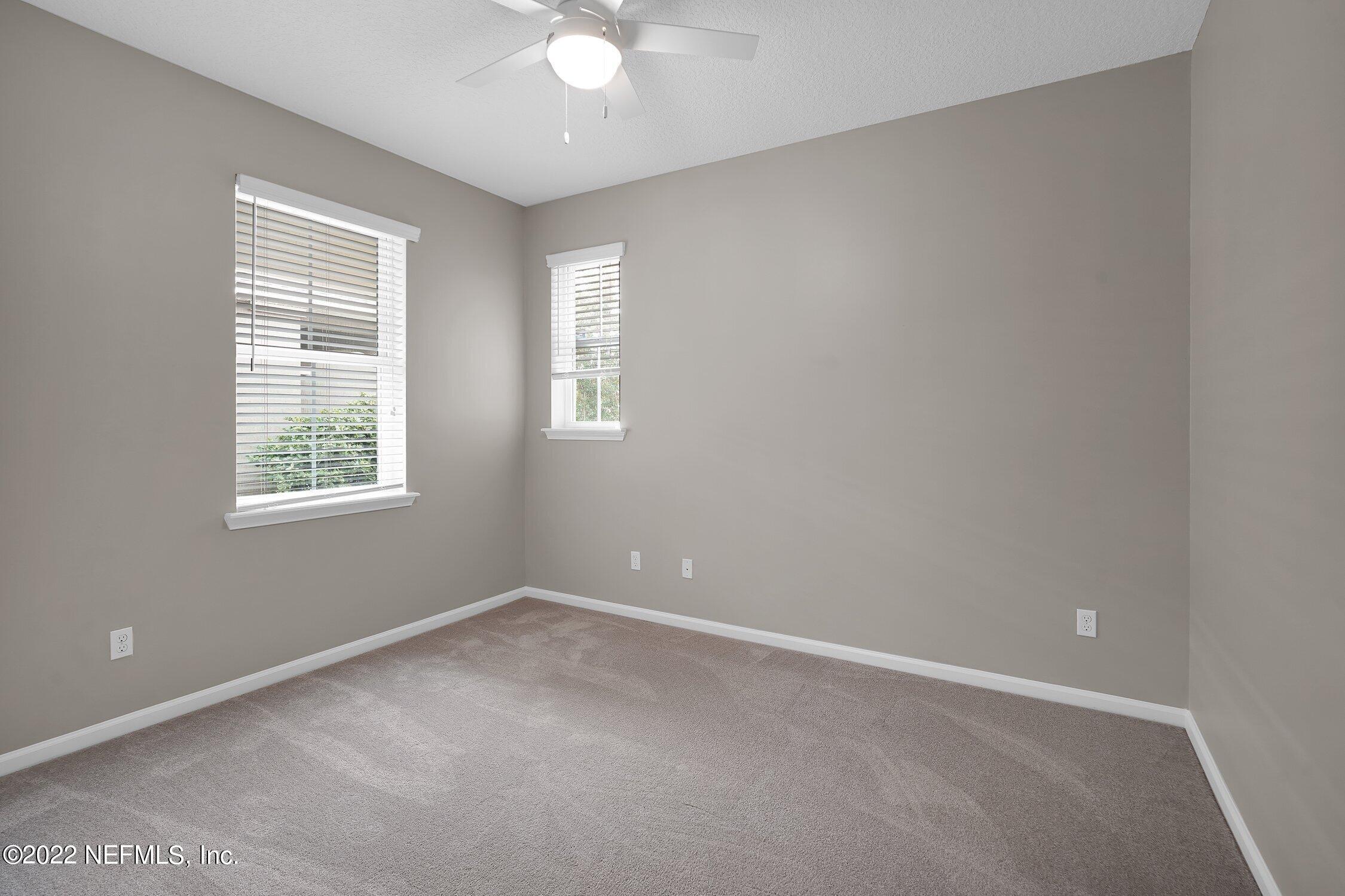 242 Taylor Ridge Avenue Ponte Vedra, FL 32081 - Photo 15 of 26 an empty room with windows