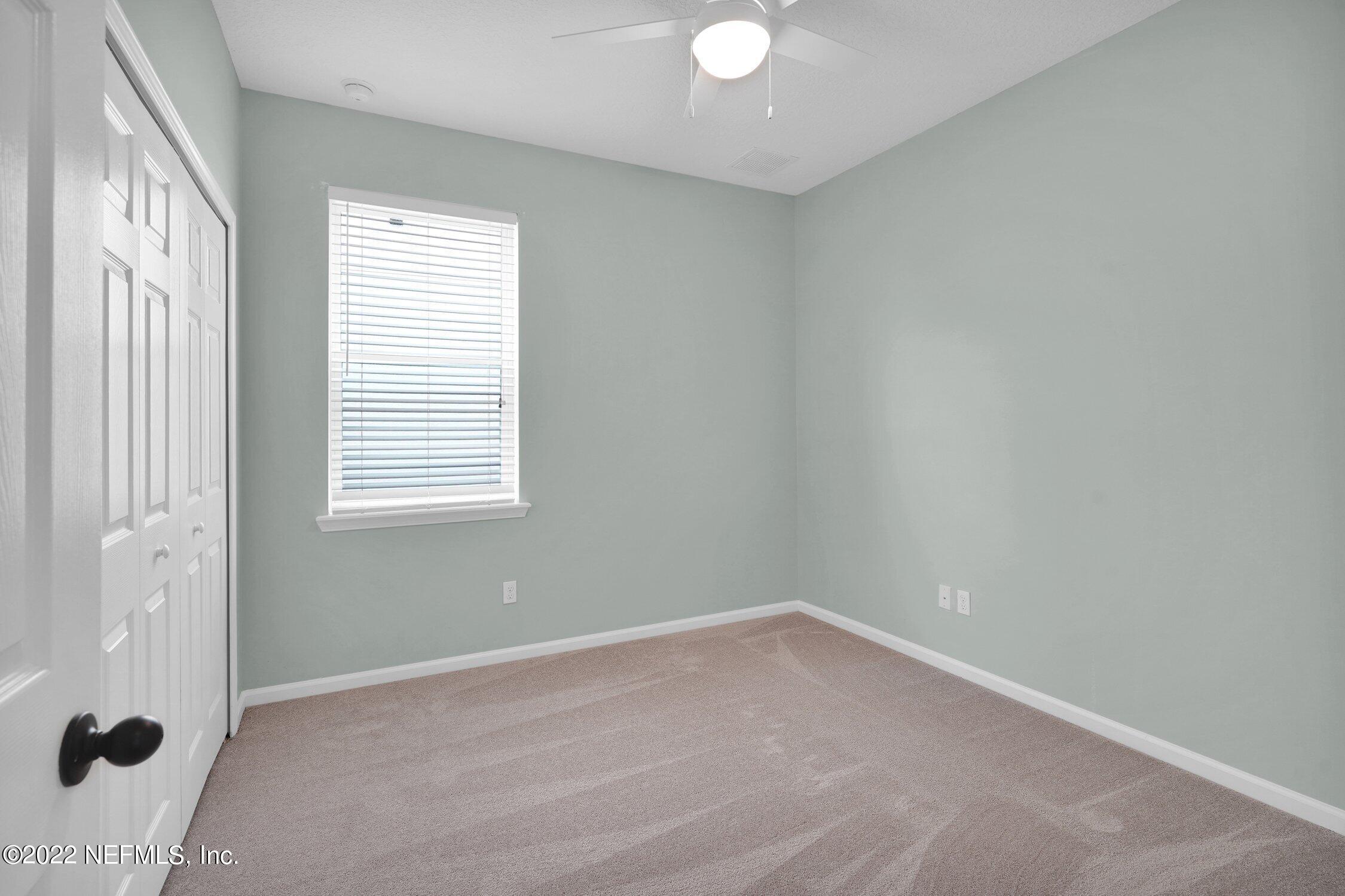 242 Taylor Ridge Avenue Ponte Vedra, FL 32081 - Photo 18 of 26 a view of an empty room with a window