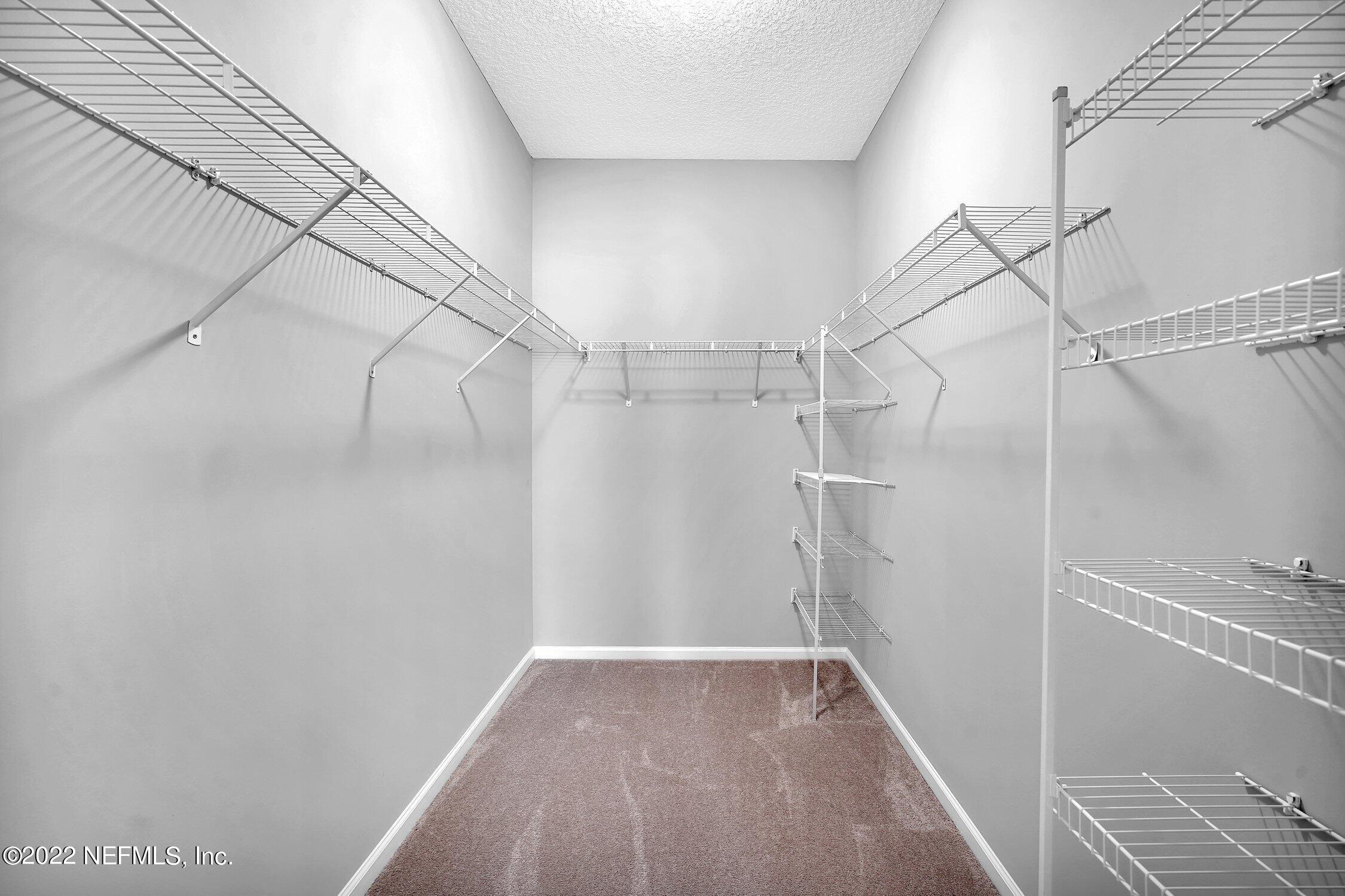 242 Taylor Ridge Avenue Ponte Vedra, FL 32081 - Photo 23 of 26 a view of a room with racks on the wall