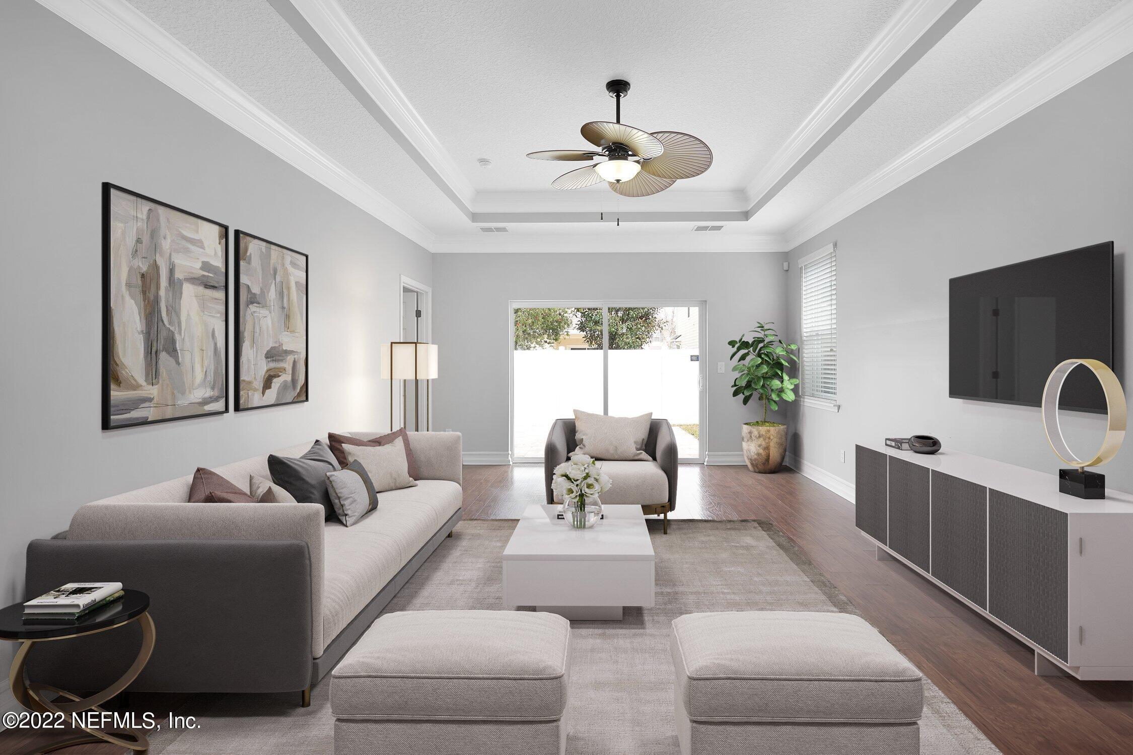 242 Taylor Ridge Avenue Ponte Vedra, FL 32081 - Photo 4 of 26 a living room with furniture and a flat screen tv