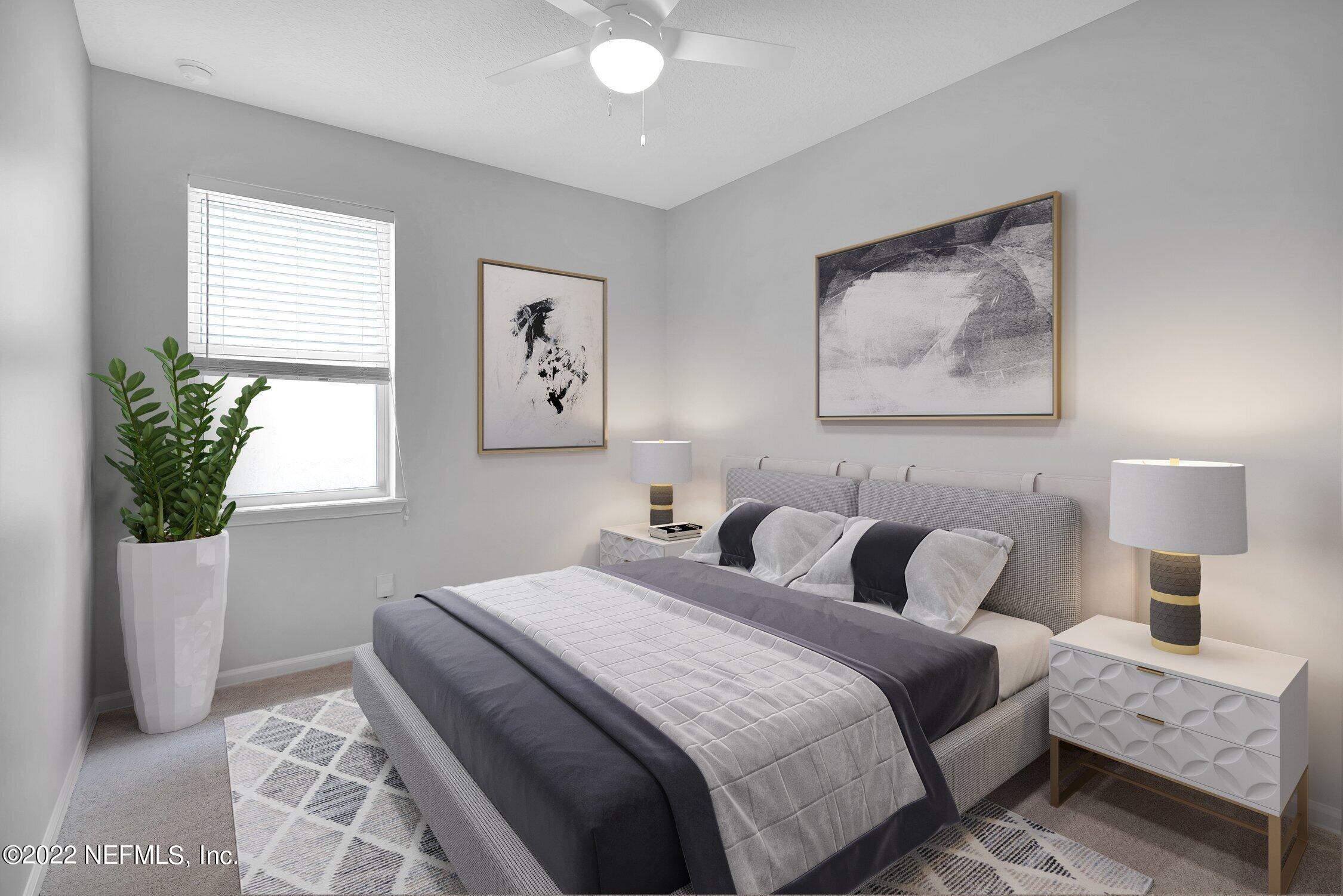 242 Taylor Ridge Avenue Ponte Vedra, FL 32081 - Photo 6 of 26 a bedroom with bed and window