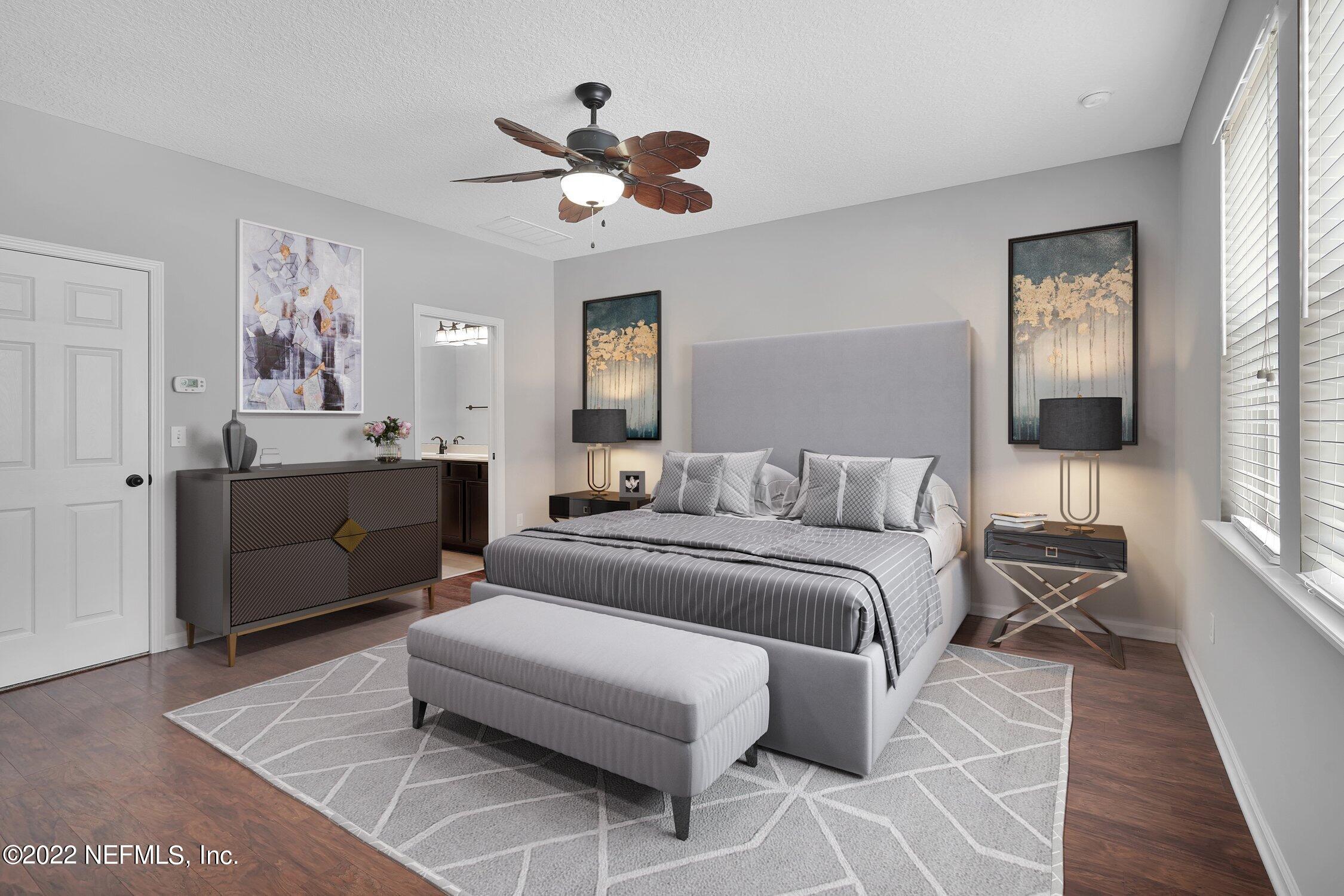 242 Taylor Ridge Avenue Ponte Vedra, FL 32081 - Photo 7 of 26 a living room with furniture and a chandelier