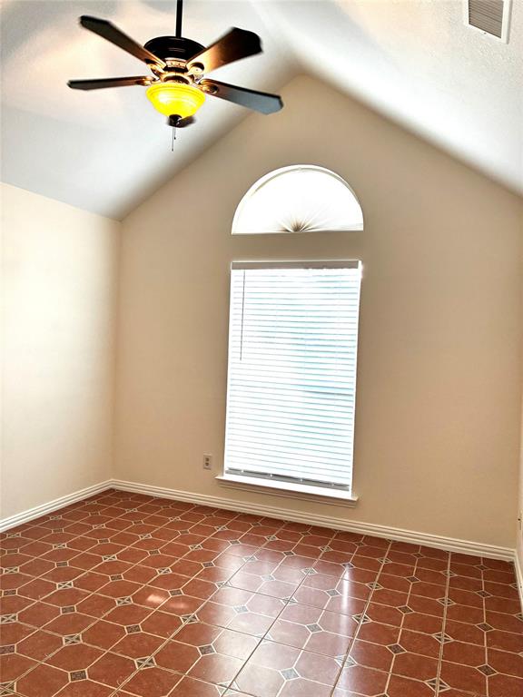 7936 Tournament Road Frisco, TX 75035 - Photo 19 of 28 an empty room with a window and entertaining space