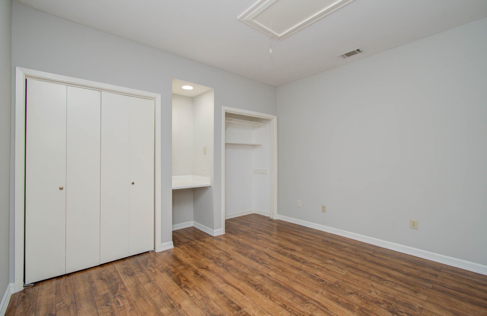 12697 Briar Patch Drive, Unit 2 Houston, TX 77077 - Photo 14 of 24 a view of empty room with wooden floor