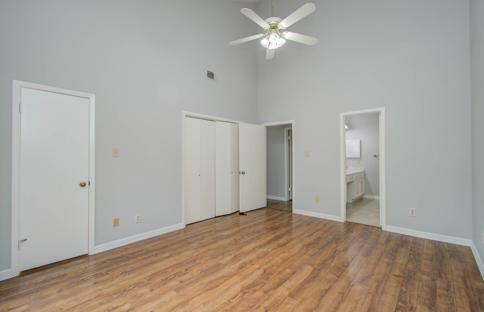 12697 Briar Patch Drive, Unit 2 Houston, TX 77077 - Photo 19 of 24 a view of empty room with wooden floor