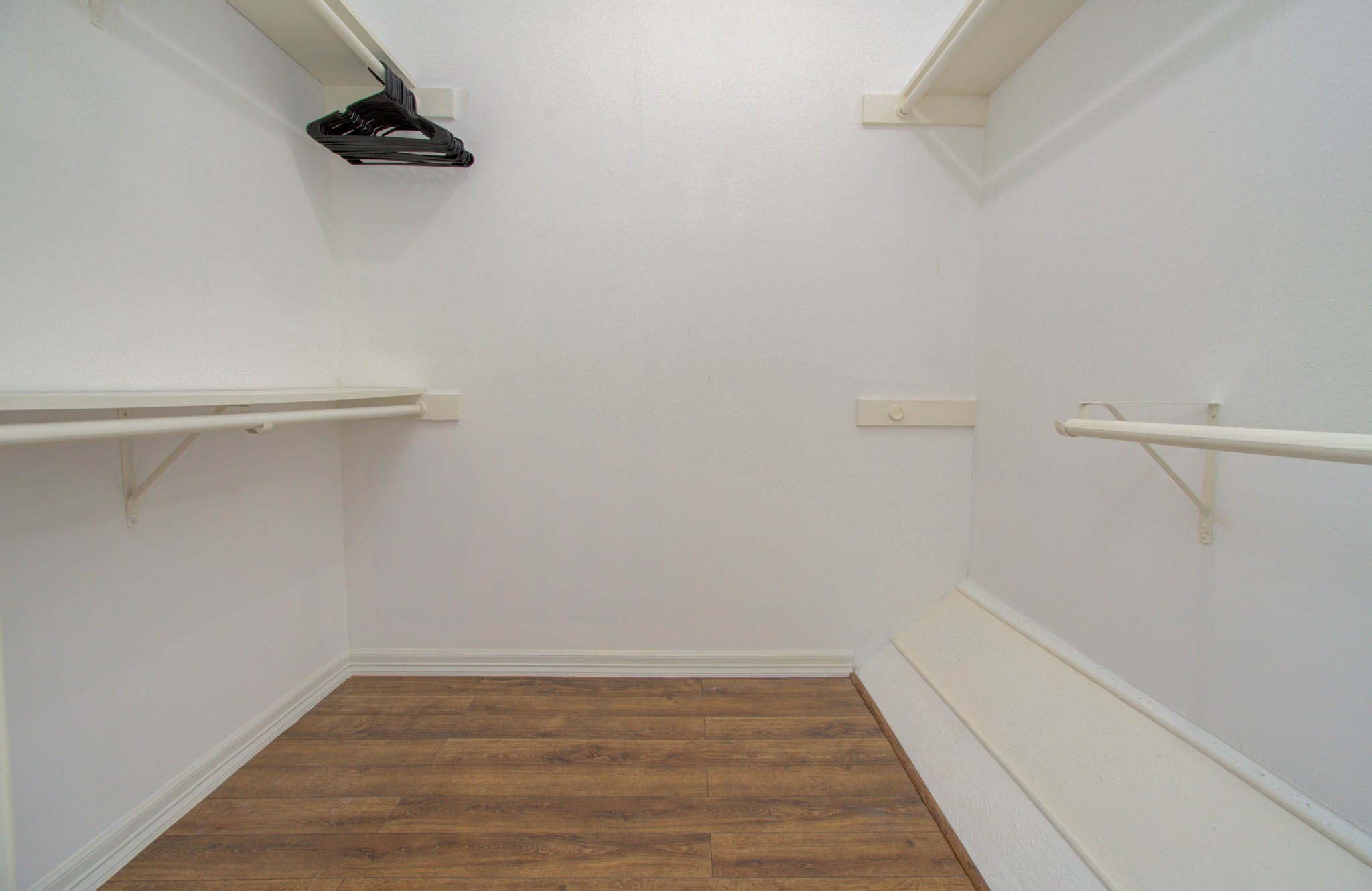 12697 Briar Patch Drive, Unit 2 Houston, TX 77077 - Photo 20 of 24 a view of a room with racks on the wall