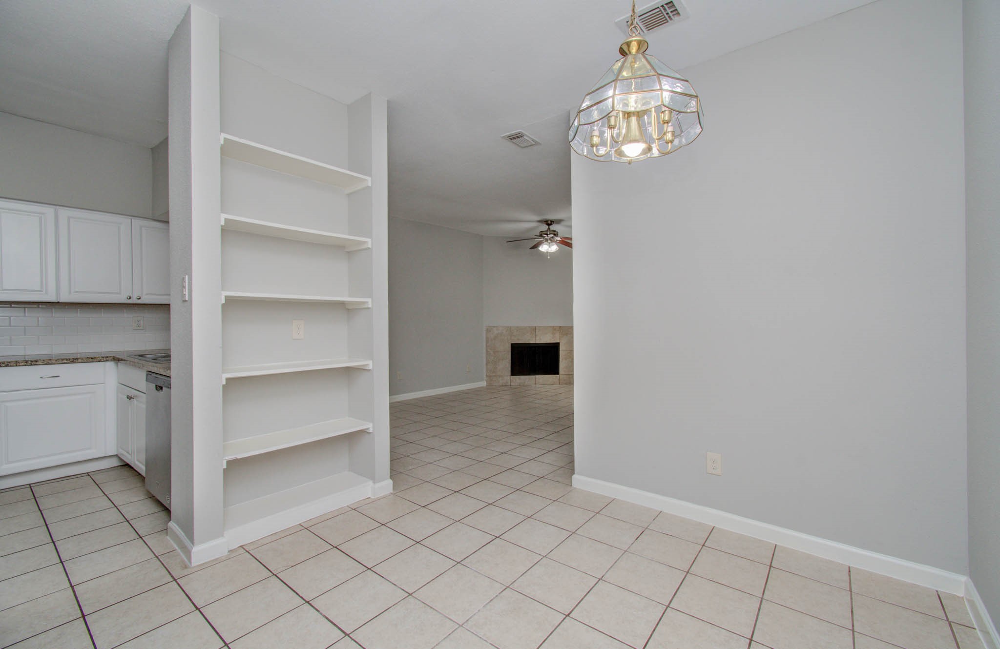 12697 Briar Patch Drive, Unit 2 Houston, TX 77077 - Photo 6 of 24 a view of an empty room with a cabinet