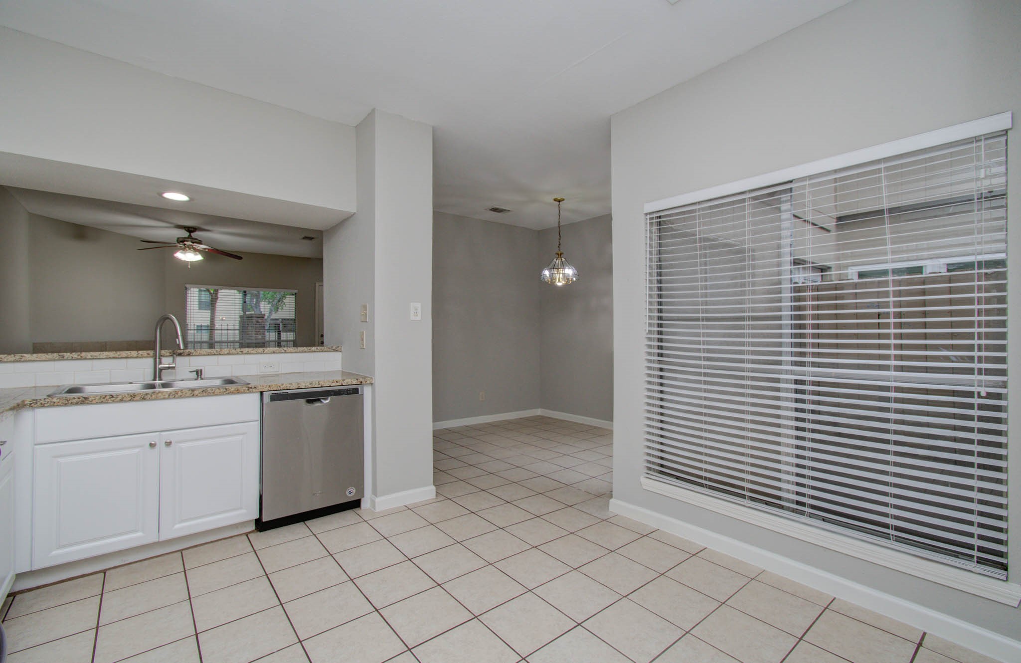 12697 Briar Patch Drive, Unit 2 Houston, TX 77077 - Photo 9 of 24 a bathroom with a sink and a mirror