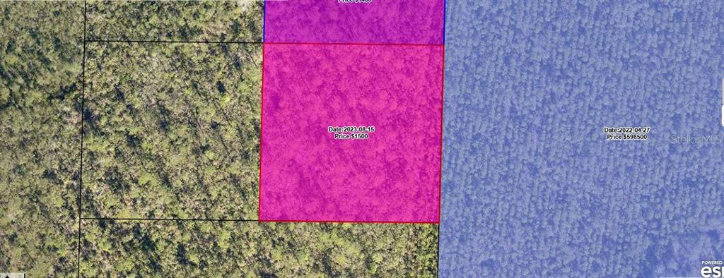 12241 Pineridge Road Fountain, FL 32438 - Photo 1 of 6 a view of a red door and chair