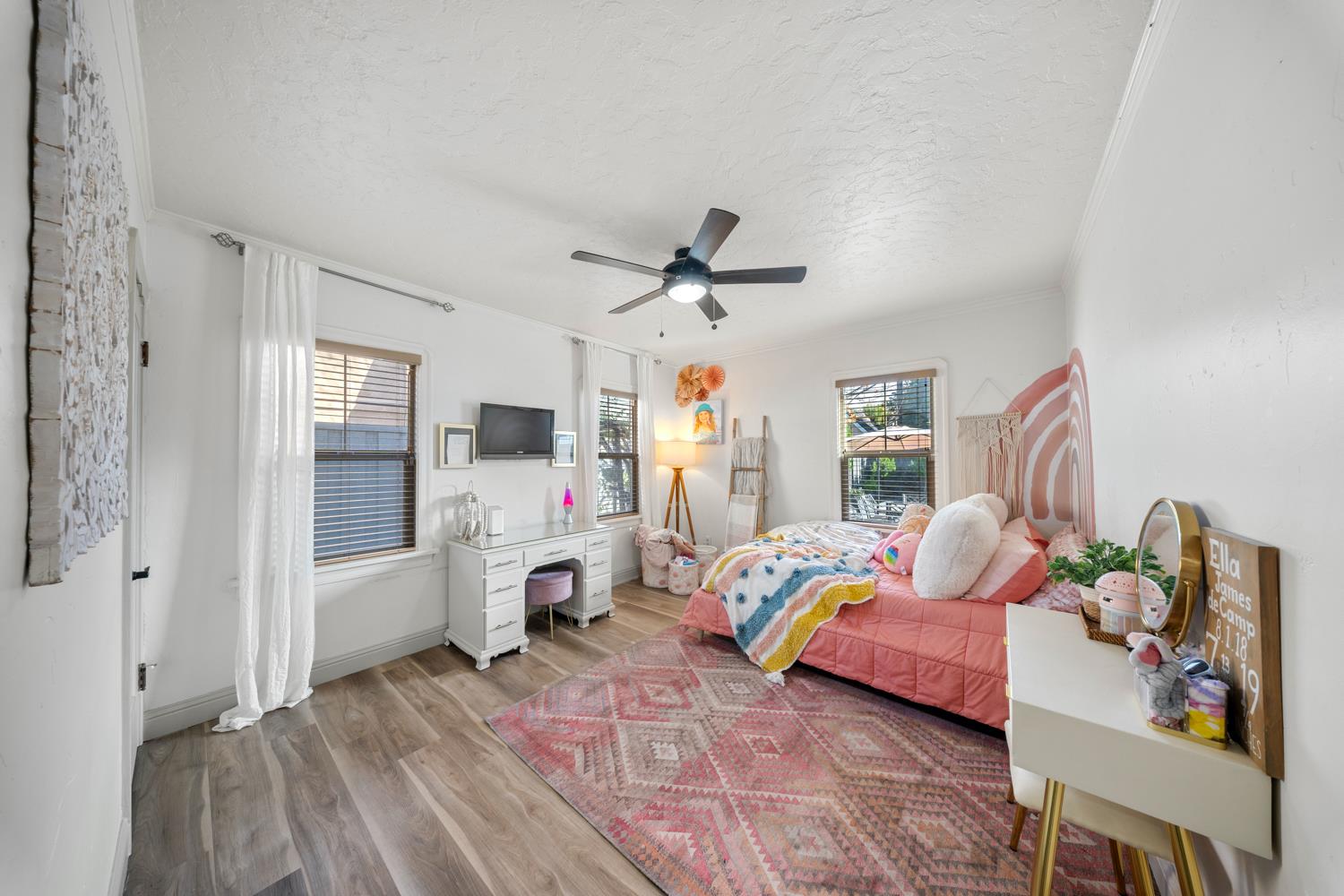 530 Myrtle Avenue Modesto, CA 95350 - Photo 20 of 29 a bedroom with furniture and a wooden floor