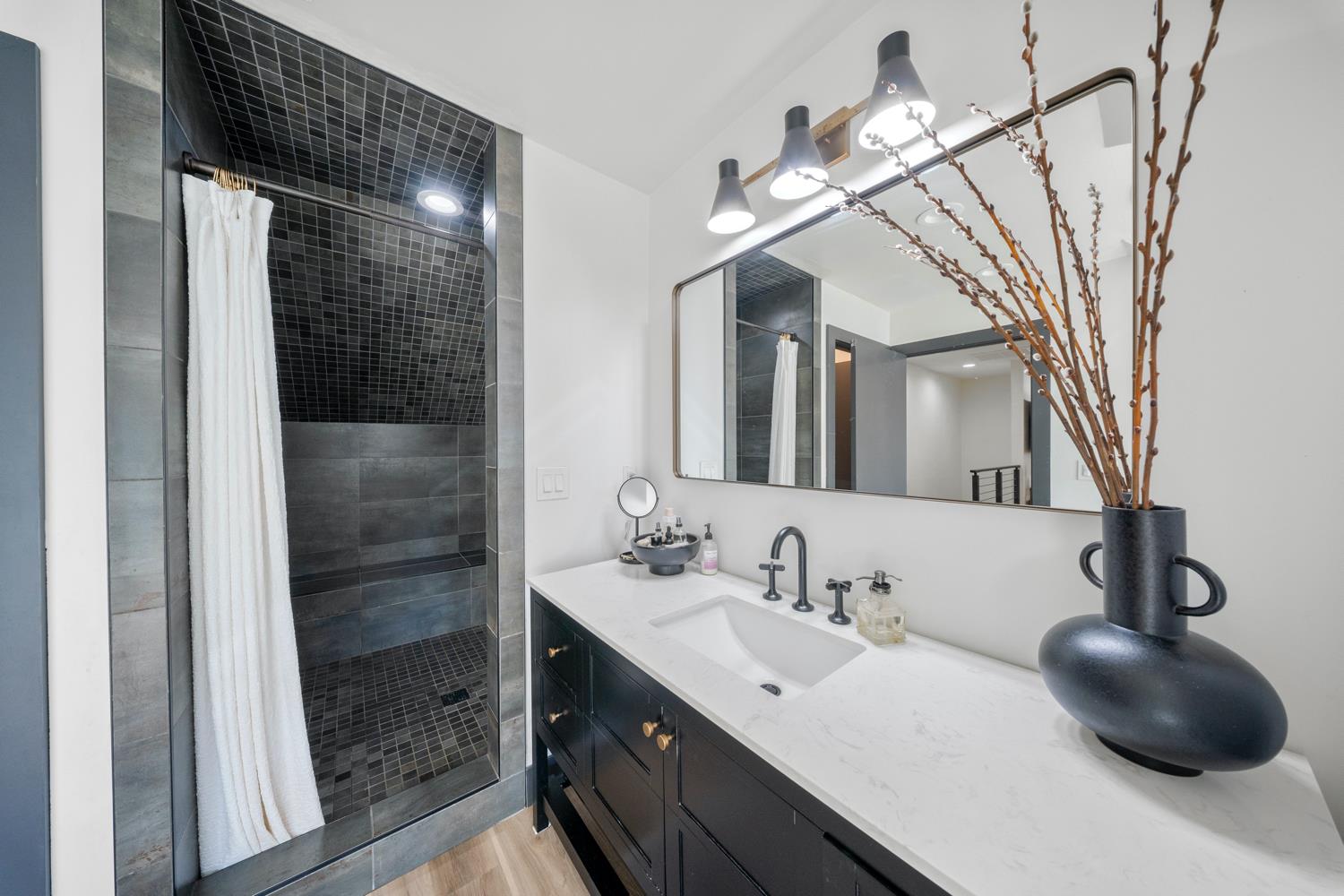 530 Myrtle Avenue Modesto, CA 95350 - Photo 27 of 29 a bathroom with a double vanity sink mirror and shower