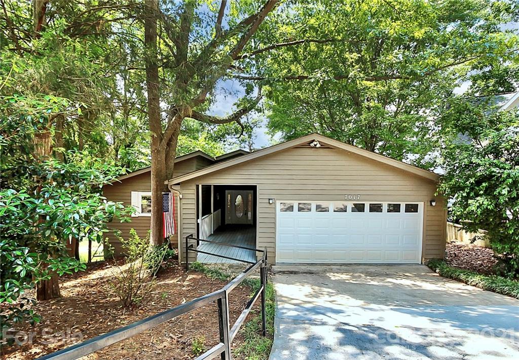 7017 Chelsea Day Lane Tega Cay, SC 29708 - Photo 3 of 48 a view of a house with a yard