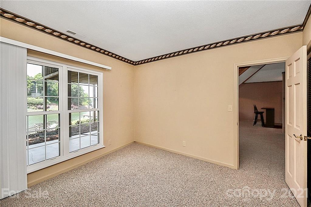 7017 Chelsea Day Lane Tega Cay, SC 29708 - Photo 28 of 48 a view of an empty room