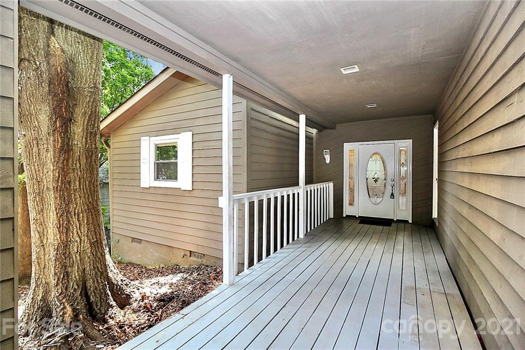 7017 Chelsea Day Lane Tega Cay, SC 29708 - Photo 5 of 48 a view of a wooden deck