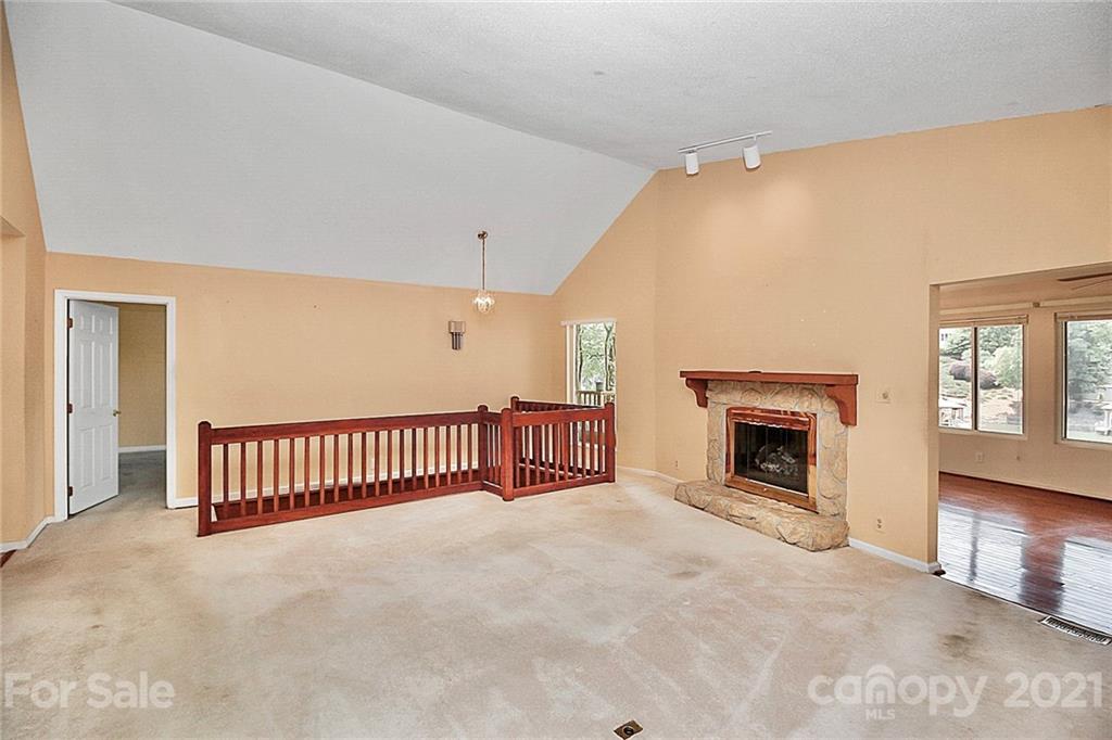 7017 Chelsea Day Lane Tega Cay, SC 29708 - Photo 7 of 48 a view of a livingroom with a fireplace