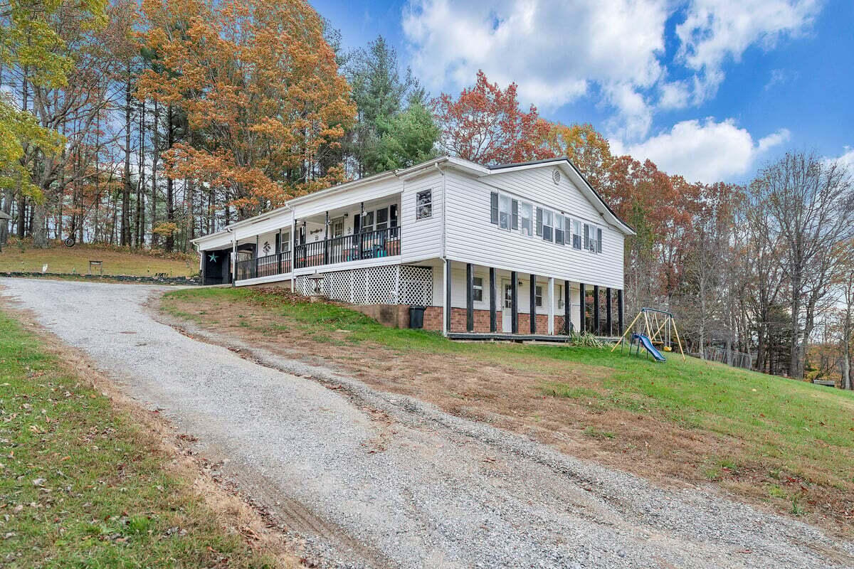 446 Macks Mountain Road Northwest Indian Valley, VA 24105 - Photo 12 of 59 a front view of a house with a garden