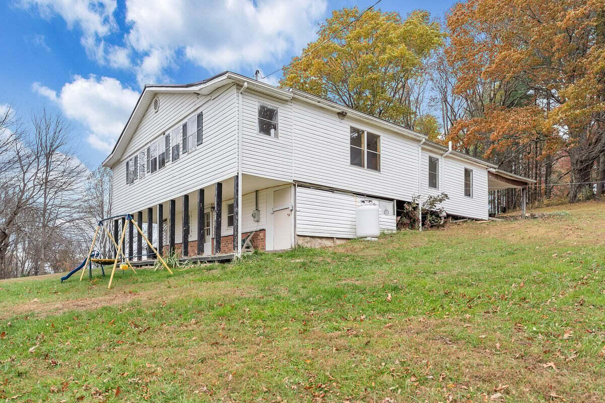 446 Macks Mountain Road Northwest Indian Valley, VA 24105 - Photo 14 of 59 a view of a house with a yard