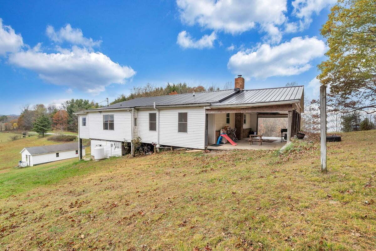 446 Macks Mountain Road Northwest Indian Valley, VA 24105 - Photo 17 of 59 a view of a house with backyard porch and garden