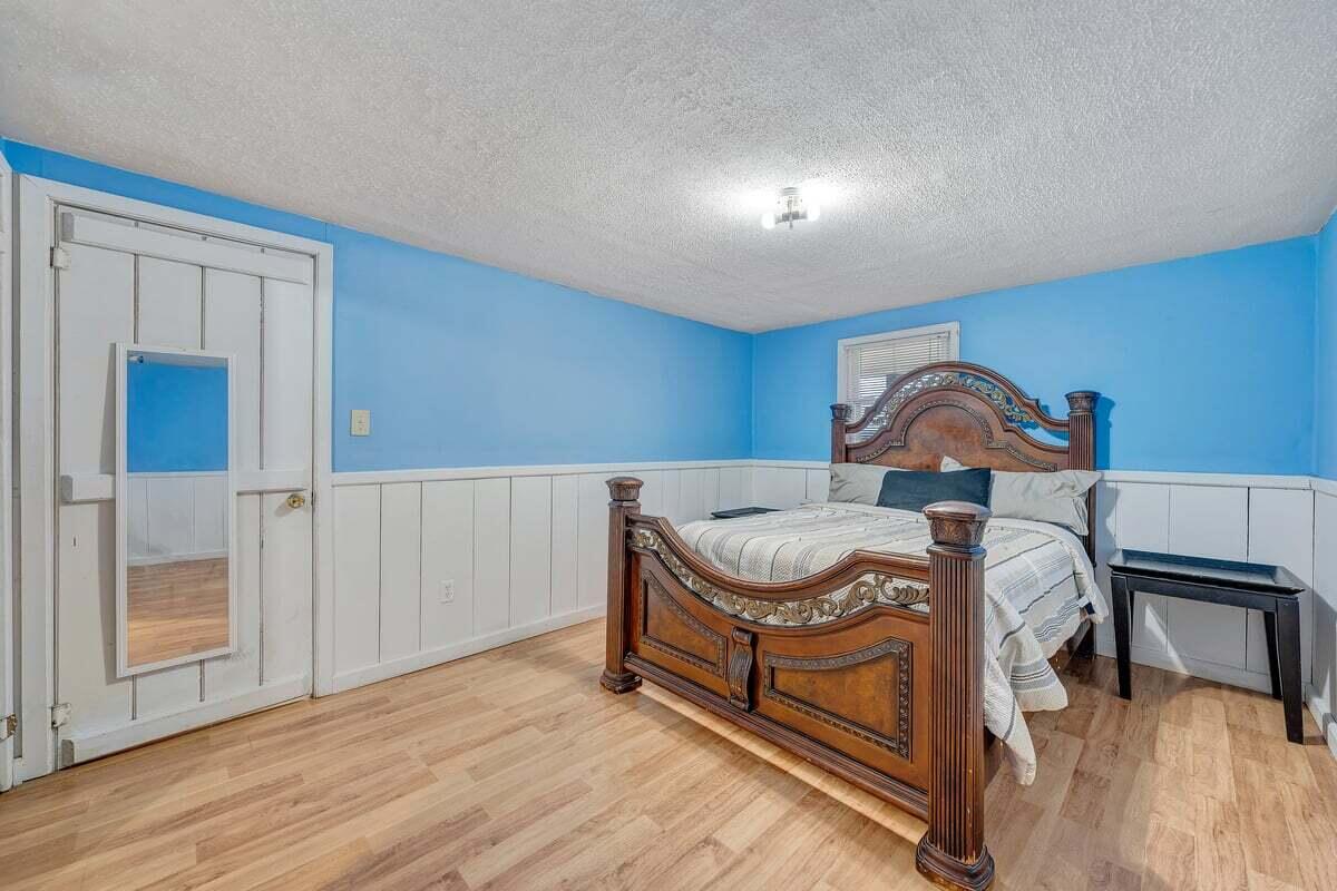 446 Macks Mountain Road Northwest Indian Valley, VA 24105 - Photo 29 of 59 a bedroom with a bed and a dresser