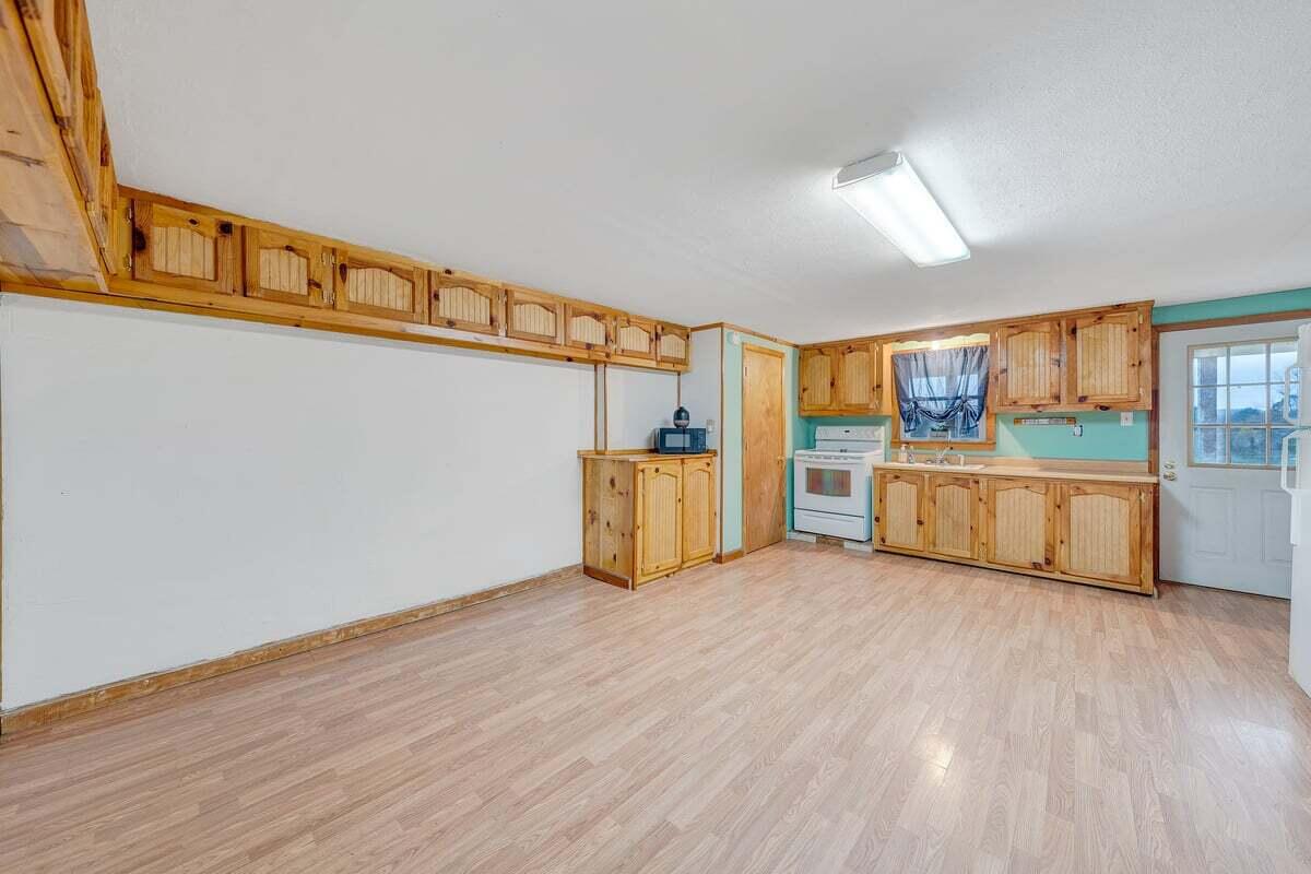 446 Macks Mountain Road Northwest Indian Valley, VA 24105 - Photo 35 of 59 a view of a kitchen with a sink and cabinets