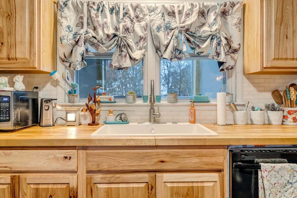 446 Macks Mountain Road Northwest Indian Valley, VA 24105 - Photo 50 of 59 a bathroom with a sink and a mirror