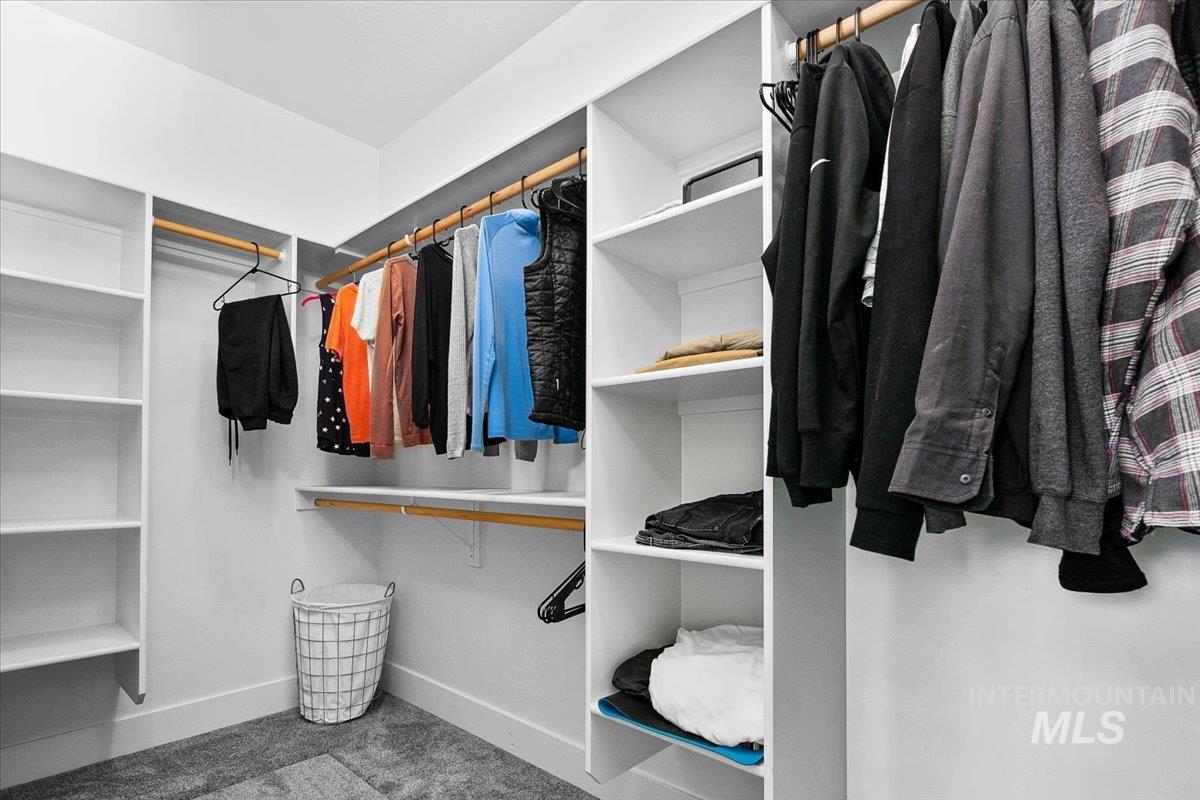 2085 North Concha Court Middleton, ID 83644 - Photo 21 of 37 Walk in closet featuring light colored carpet