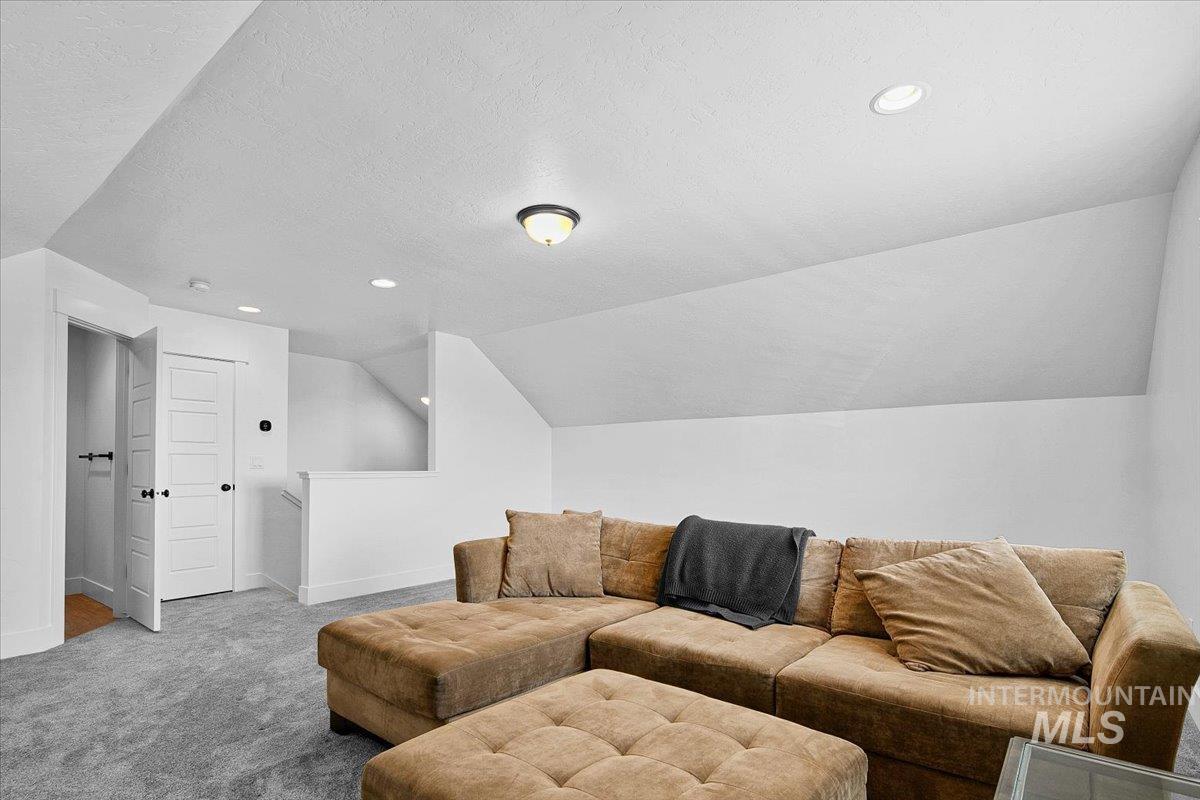 2085 North Concha Court Middleton, ID 83644 - Photo 31 of 37 Carpeted living area featuring recessed lighting