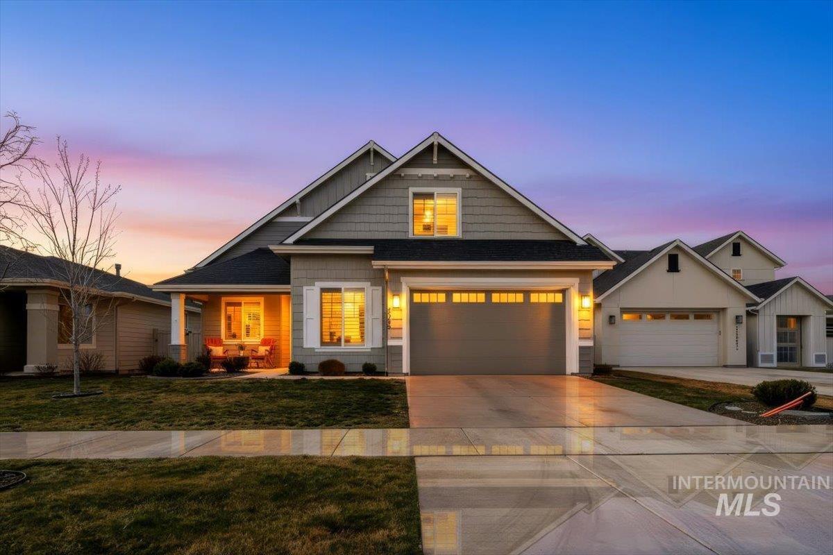 2085 North Concha Court Middleton, ID 83644 - Photo 4 of 37 Craftsman-style house featuring covered porch, concrete driveway, and a yard