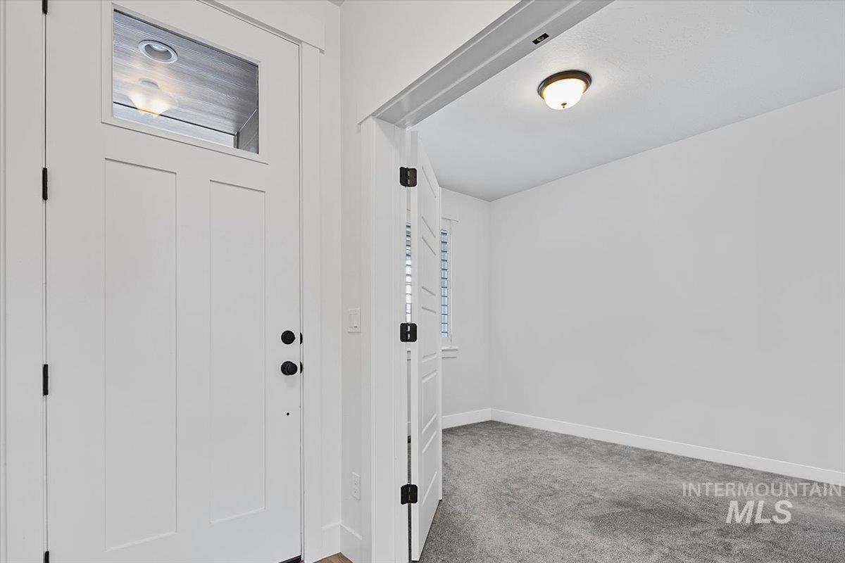 2085 North Concha Court Middleton, ID 83644 - Photo 6 of 37 Entryway with baseboards and light carpet