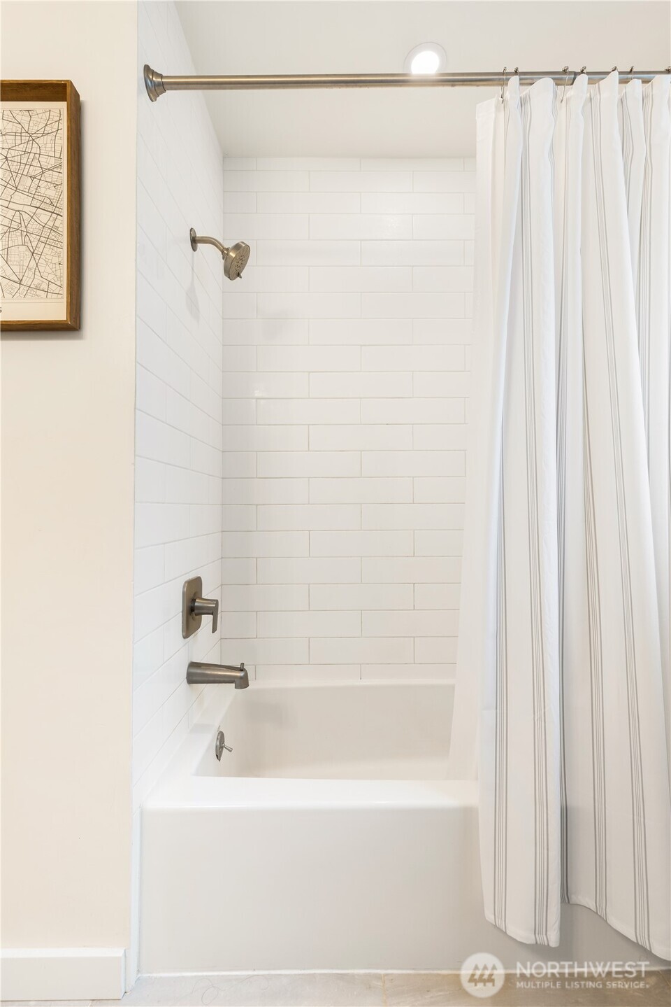 6301 22nd Avenue Northwest Seattle, WA 98107 - Photo 15 of 19 a bathroom with a shower and a bath tub