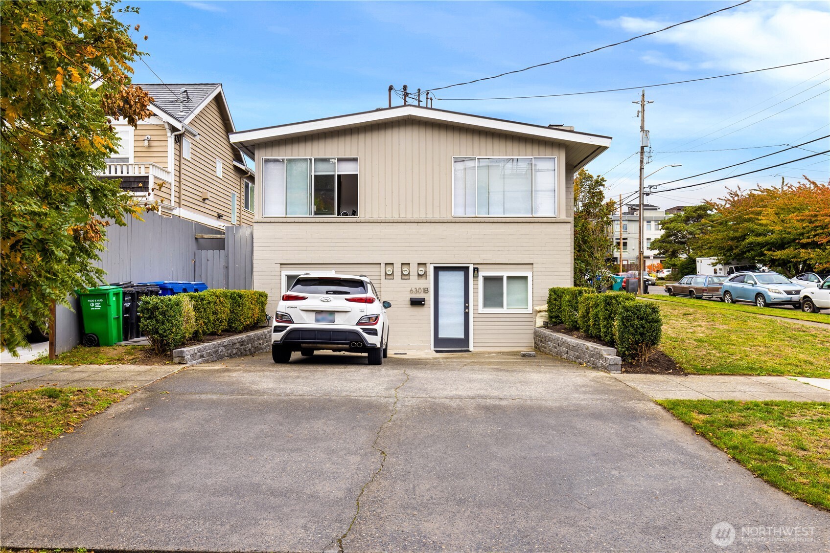 6301 22nd Avenue Northwest Seattle, WA 98107 - Photo 5 of 19 a car parked in front of a house