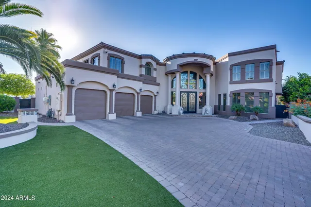 a kitchen with stainless steel appliances granite countertop a stove and a sink