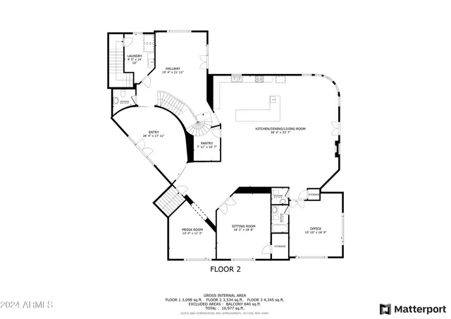 a view of a livingroom with furniture and a window
