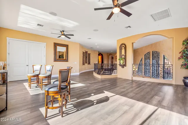 a bedroom with a bed a desk and chair